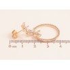 Серьги Xuping M&L цвет 18K пусеты "Ассиметричные кристальные цветочки с кольцами" фото №2 Серьги Xuping M&L цвет 18K пусеты "Ассиметричные кристальные цветочки с кольцами" фото №2