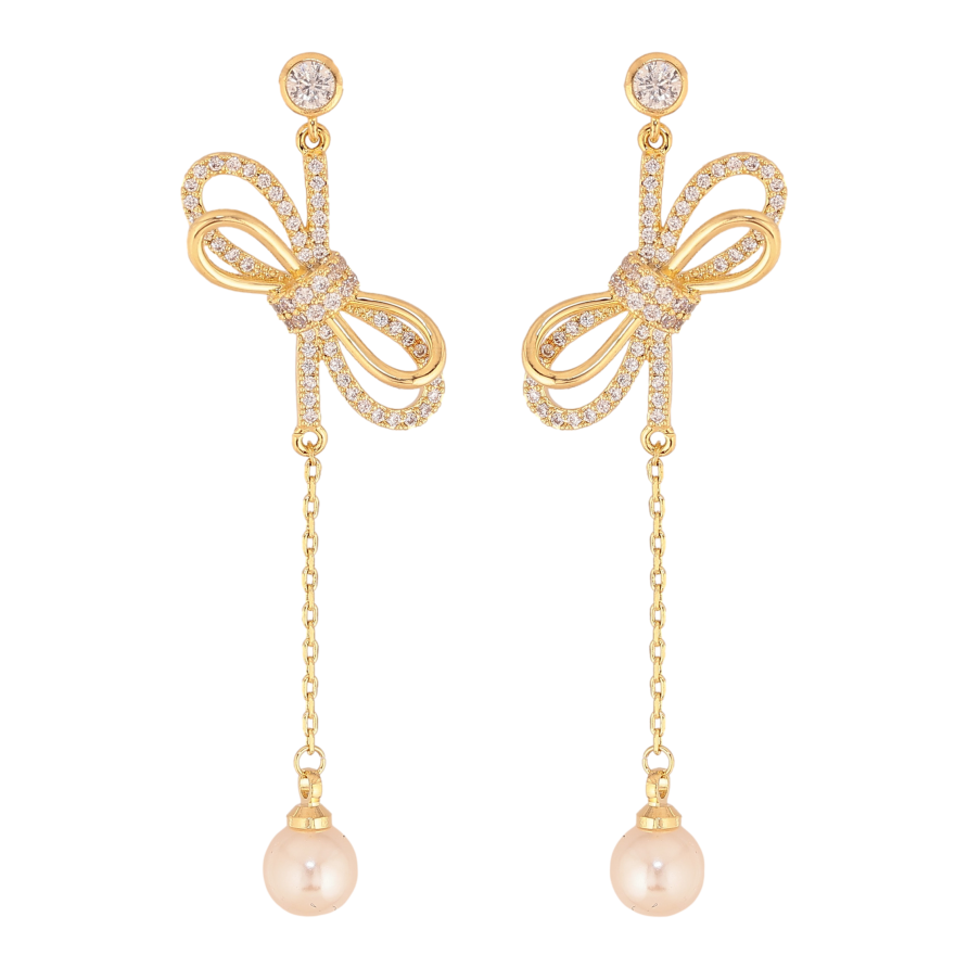 Серьги Xuping цвет 14K с кристаллами Swarovski пусеты "Бантики с кристаллами Clear и жемчужинами" фото №1 Серьги Xuping цвет 14K с кристаллами Swarovski пусеты "Бантики с кристаллами Clear и жемчужинами" фото №1