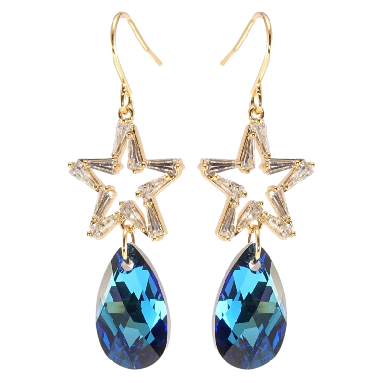 Сережки Xuping колір 18K з кристалами Swarovski французький замок Зірки з кристалами Bermuda Blue фото №2 Сережки Xuping колір 18K з кристалами Swarovski французький замок Зірки з кристалами Bermuda Blue фото №2