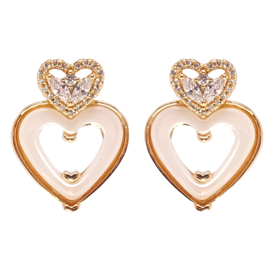 Серьги Xuping Позолота 18K пусеты Сердечки с белой керамикой и фианитами фото №1 Серьги Xuping Позолота 18K пусеты Сердечки с белой керамикой и фианитами фото №1