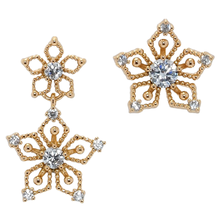 Сережки Xuping QQMM Позолота 18K пусети Асиметричні квіточки фото №1 Сережки Xuping QQMM Позолота 18K пусети Асиметричні квіточки фото №1