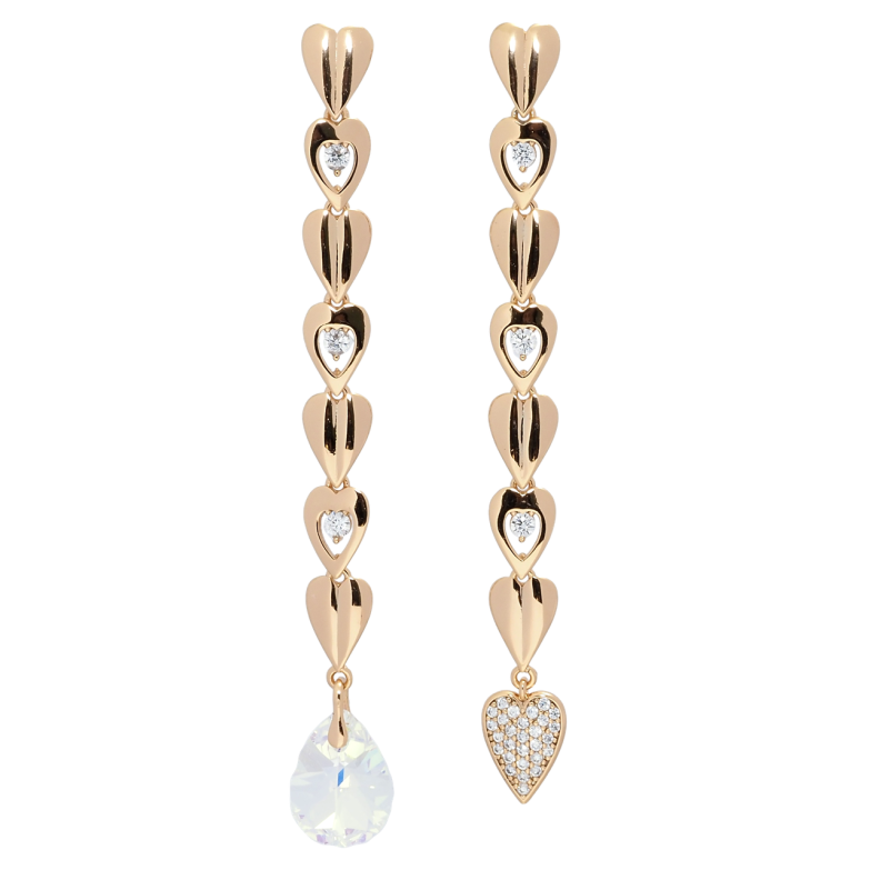 Сережки Xuping колір 18K з кристалами Swarovski пусети Асиметричні серця з кристалом Shimmer фото №12 Сережки Xuping колір 18K з кристалами Swarovski пусети Асиметричні серця з кристалом Shimmer фото №12